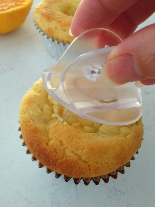 using a cupcake corer for Easy Gluten Free Muffins with orange and chocolate!