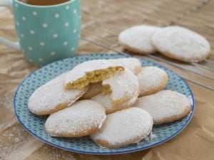 A plate full of easy gluten free vanilla and almond cookies
