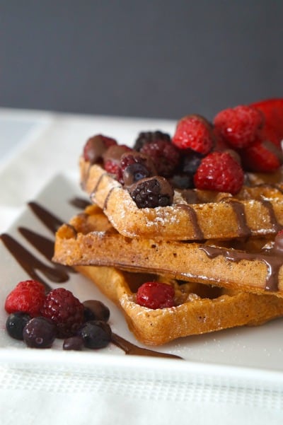 Gluten Free, Egg Free Chocolate Waffles with fresh berries and melted chocolate