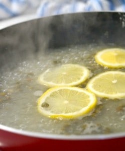 adding the lemon and capers fro Gluten Free Lemon Chicken Piccata